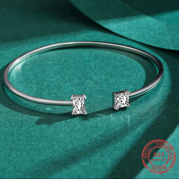 Luxury 925 Sterling Silver Asymmetrical Bangle Bracelet Adorned with AAAAA Zirconia - Perfect for Weddings and Special Occasions
