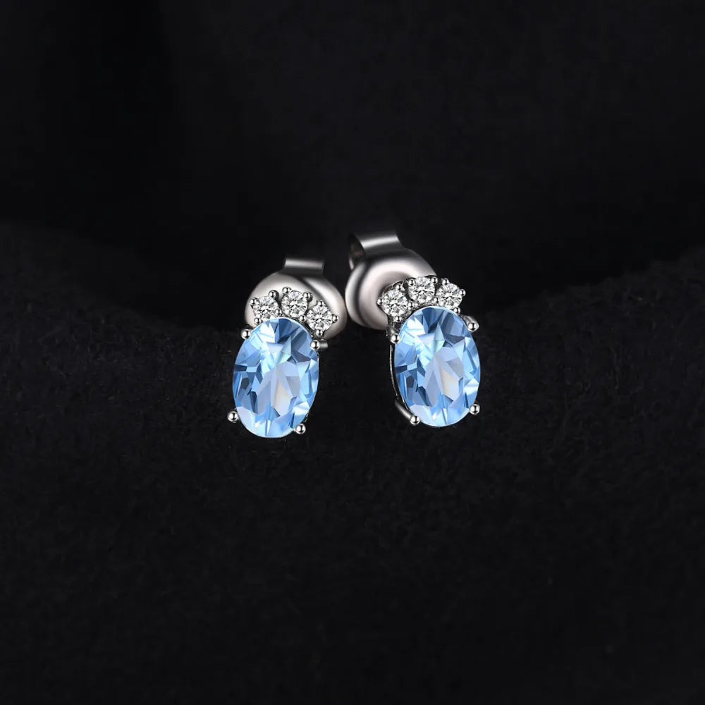 Elegant Crown Design 1Ct Oval Natural Sky Blue Topaz Stud Earrings Crafted in 925 Sterling Silver - Perfect Birthday Gift for Women