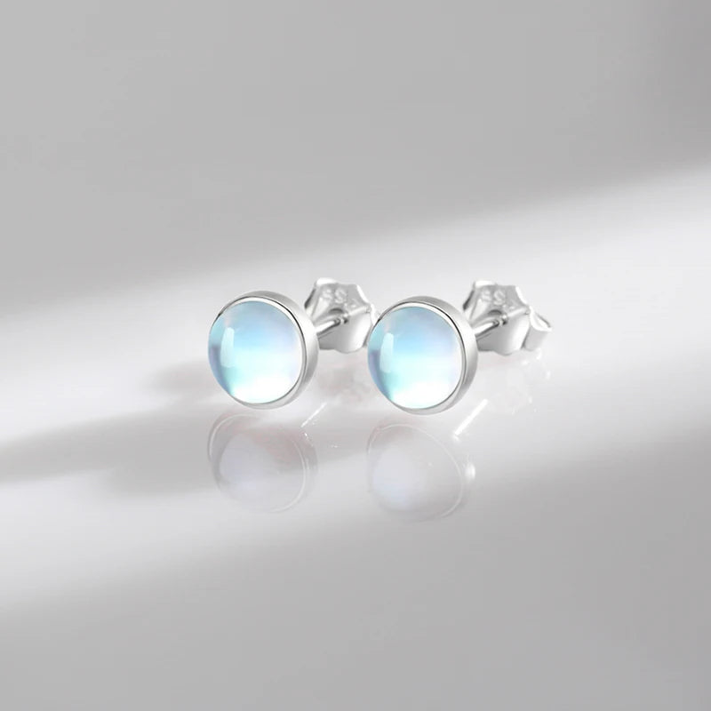 Elegant 925 Sterling Silver Round Moonstone Stud Earrings - Radiate Charm with Platinum Plated Design for Women