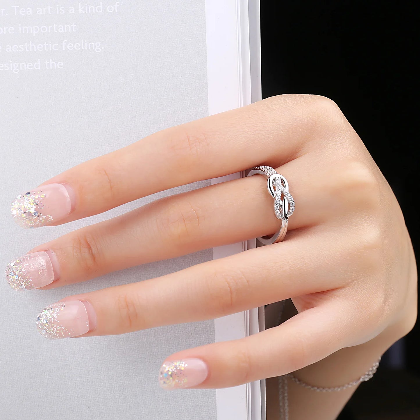 Elevate Your Elegance with the Infinity Love Knot 925 Sterling Silver Gemstone Ring