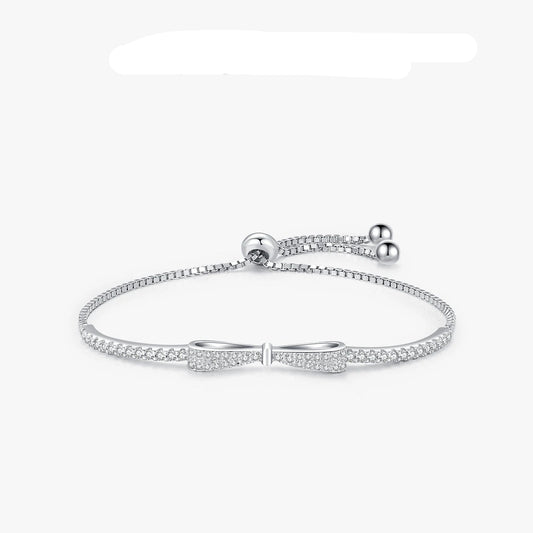 Elevate Your Elegance: 925 Sterling Silver Bowknot Bracelet with Sparkling Zirconia for Women - Adjustable Luxury Chain Link Design