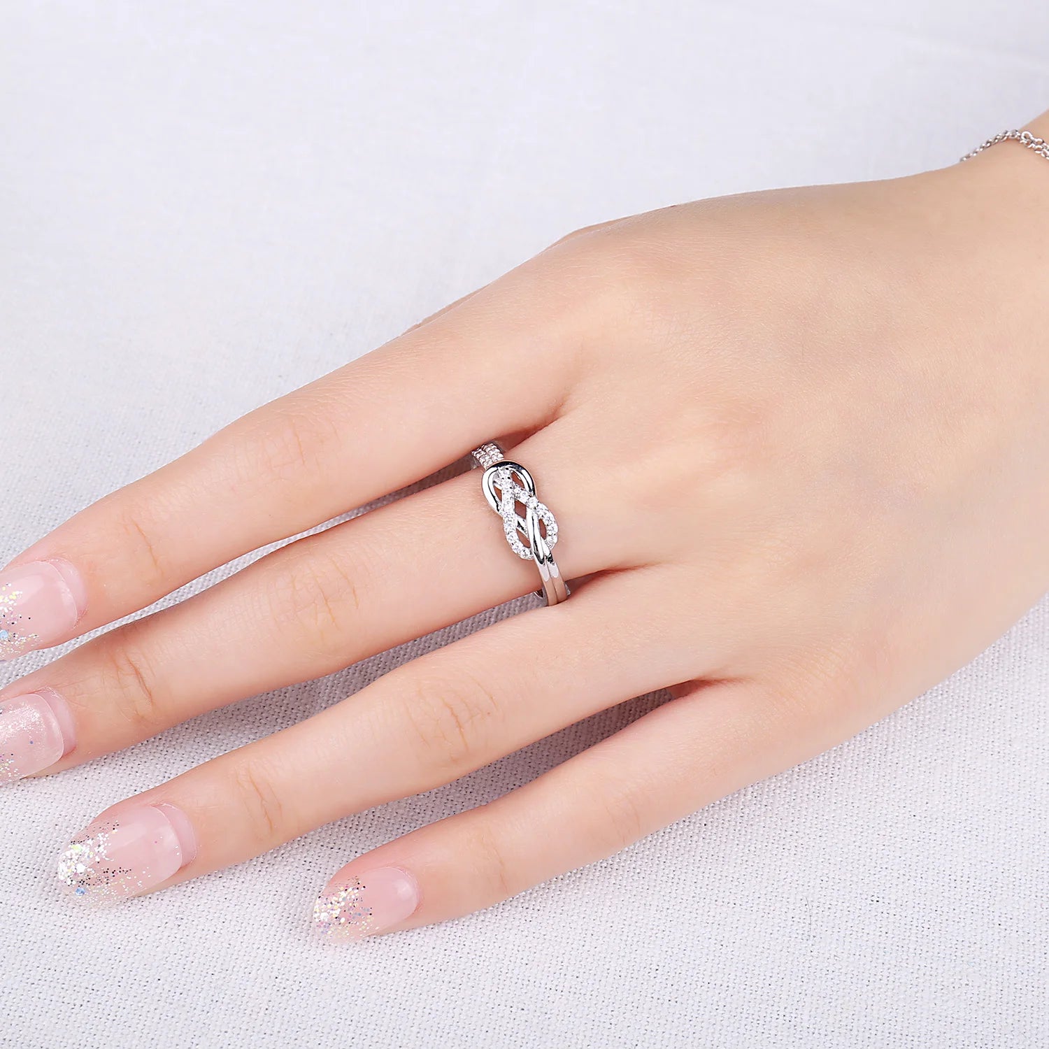 Elevate Your Elegance with the Infinity Love Knot 925 Sterling Silver Gemstone Ring