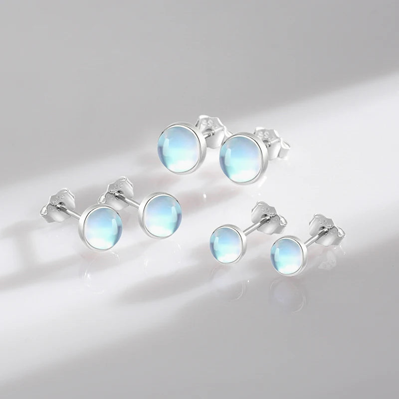 Elegant 925 Sterling Silver Round Moonstone Stud Earrings - Radiate Charm with Platinum Plated Design for Women