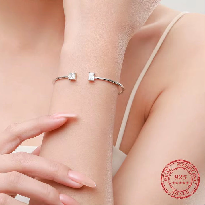 Luxury 925 Sterling Silver Asymmetrical Bangle Bracelet Adorned with AAAAA Zirconia - Perfect for Weddings and Special Occasions